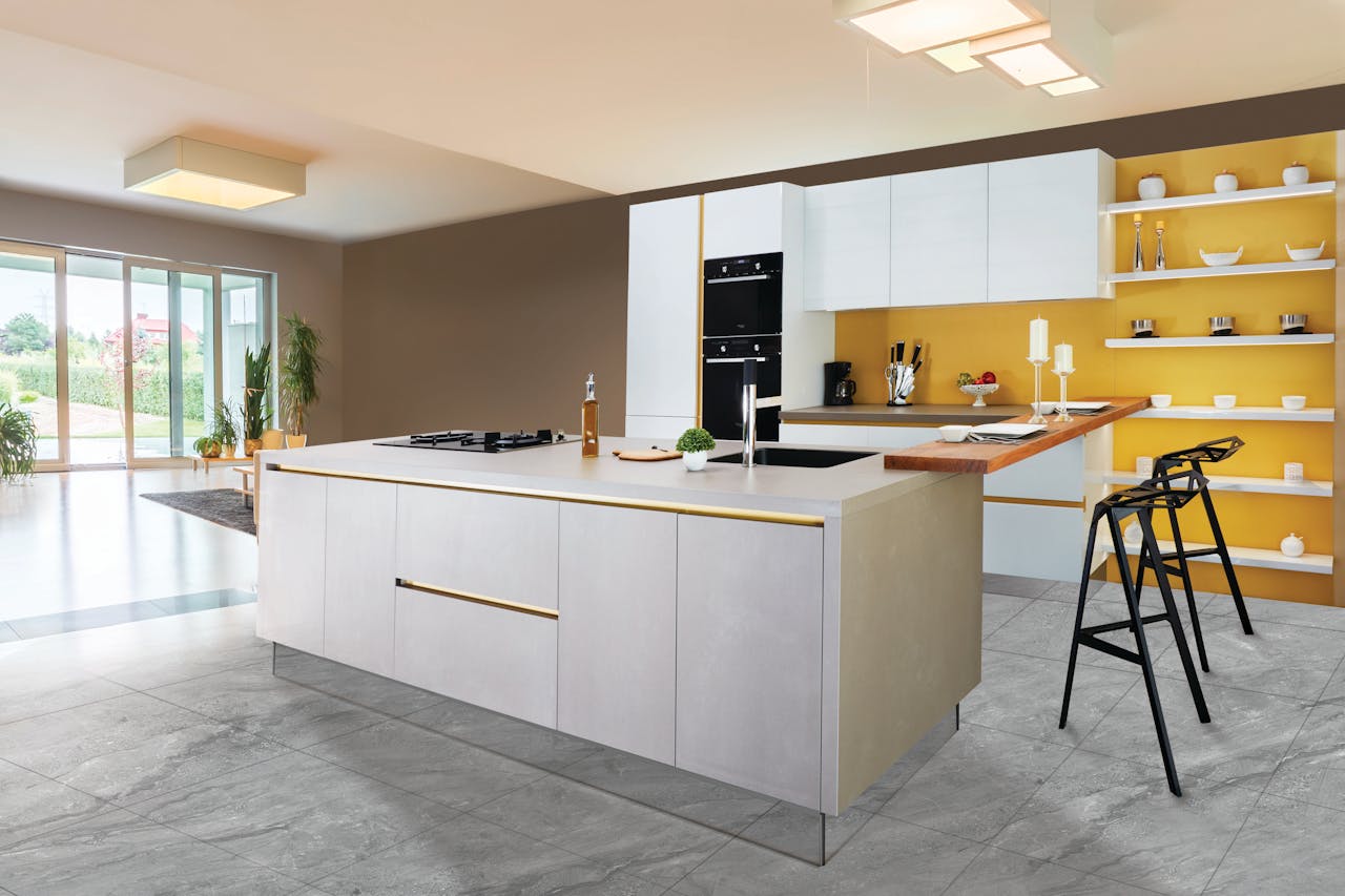 heros-img Sleek and modern kitchen interior featuring a large island and open shelving in a contemporary setting.